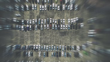 Aerial view of cars parked at parking lot