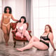 Group of 3 oversize women posing in studio