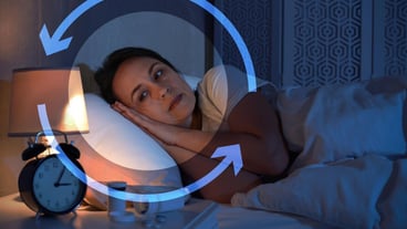 Mature woman suffering from insomnia in bed at night Problem of sleep deprivation