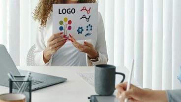 Designing new company logo in business meeting