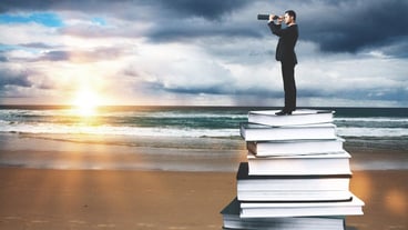 Businessman with binoculars
