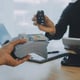 Salesman send key to customer after good deal agreement successful car loan contract buying or selling new vehicle