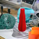 Bright colorful objects printed by a 3d printer close-up. Progressive modern additive technology. Copy spase, spase for text.