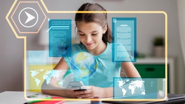Girl with smartphone learning geography at home
