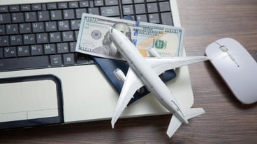 Toy airplane with a laptop computer