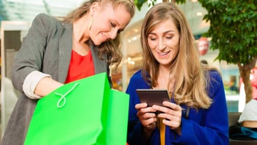 women shopping with bags at the mall