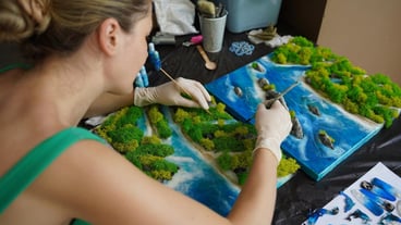 The process of making the art decor of epoxy resin natural stones and moss