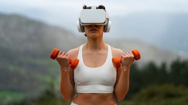Woman using vr glasses to exercise outdoors with weights