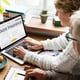 Senior couple consulting house insurance on the laptop