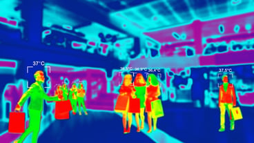 People in colorful thermal scan with celsius degree temperature