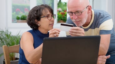 Couple of senior buy with internet