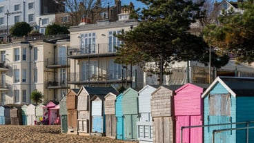 View of beach huts in Broadstairs on January 29, 2020. Two unidentified people