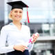 a happy student standing outside modern building