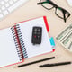 Office table with pc supplies and money cash