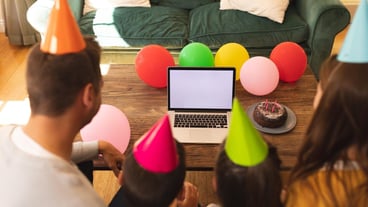 Caucasian family spending time at home together celebrating a birthday