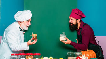 Two men in chef uniform approving restaurant service restaurant funny kitchen chefs and cooks