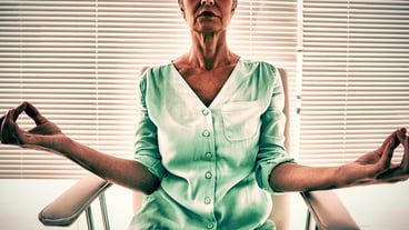 Elderly woman doing yoga