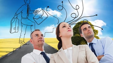 Composite image of serious work team posing together looking away