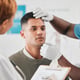 Medical nurse and patient care and tests with people in the hospital check vital signs with wellness in medicine Checklist for medical examinations of men and women in the clinic with health insurance and advice