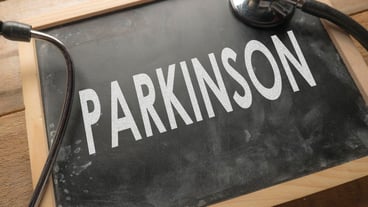 Medical and health care words writing typography lettering concept Parkinson Disease