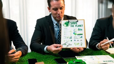 Diverse group of business professionals planning marketing with environmental responsibility for a greener ecology Productive teamwork contributes to nature conservation and a sustainable future Picturesque