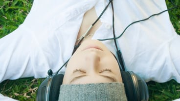 Young boy listening to music