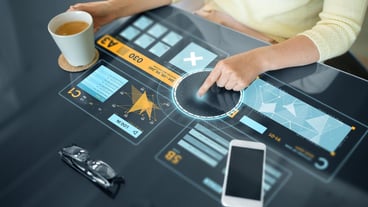 woman using interactive panel with data