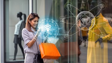 Asian woman using the smart mobile phone for check online shopping order is completed