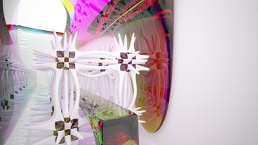 A colorful mirror with a white box in the middle