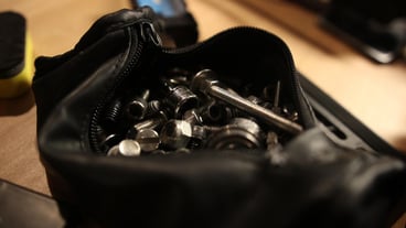 High angle view of nuts and bolts in a bag