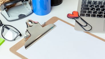 Work place of a creative person with a variety of colorful stationery objects