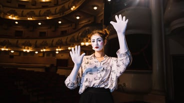 Woman performing a pantomime performance