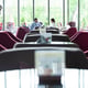 Happy business colleagues in modern office. Team of successful business people having a meeting in executive. Couple in modern cafe enjoying time together