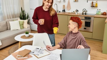 Joyful moments in a modern apartment as a young couple connects over coffee