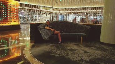 Man relaxing on sofa at hotel