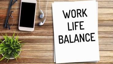 Business quotes WORK LIFE BALANCE on notebook or paper in office desk office workplace