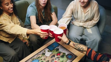 Friends Toasting With Cocktails At Party