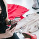 Online shopping. convenient modern technology. mobile payments and easy purchase concept of goods. woman holding smart phone and credit card in hands.