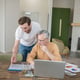 Project work. Two men working together on a project and looking interested