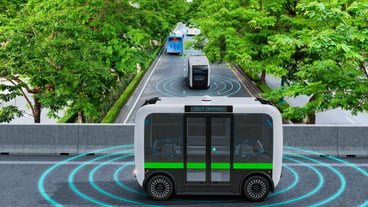 Autonomous electric shuttle bus self driving across city green road Smart vehicle concept