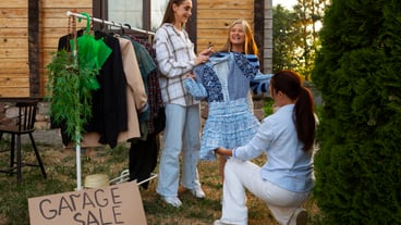 Full shot people at garage sale