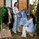 Full shot people at garage sale