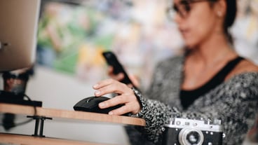 Midsection of woman using smart phone