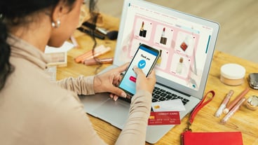 Woman shopping online on internet marketplace browsing for sale items for modern lifestyle and use credit card for online payment from wallet protected by crucial cyber security software