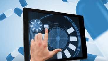 Finger selecting something on a digital tablet
