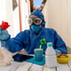 Man wearing protective workwear sitting at table