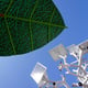 Low angle view of traditional windmill against clear blue sky