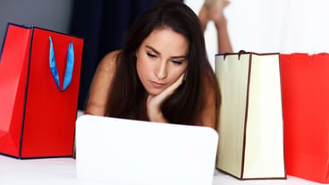 Pretty woman shopping online at home