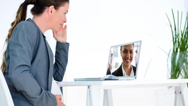 Businesswomen having video conference on laptop