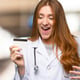 Redhead woman with a credit card caught in the hospital